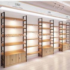 an empty store with wooden shelves and lighting