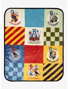 a blanket with hogwarts patches on it