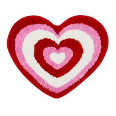 a red and white heart shaped rug on a white background with pink hearts in the middle