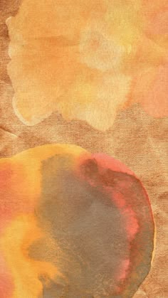 an orange and yellow abstract painting on brown paper