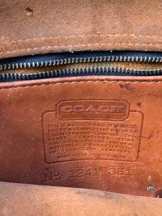 "Authentic vintage Coach purse, made in the USA (see label with made in USA and 7 digit serial number, consist with authentic 70's coach) Brown leather crossbody purse, with flap and snap closure Leather interior with one zipper pocket and one additional organizer pocket Measurements: 11\" width 7\" height 3 1/2\" base depth 47\" strap length at longest Good vintage condition! General cosmetic wear to leather surfaces and interior. Scuffs and marks throughout. Some splits in leather along piping Vintage Distressed Brown Leather Shoulder Bag, Vintage Crossbody Satchel, Vintage Distressed Brown Shoulder Bag With Leather Backing, Distressed Brown Vintage Shoulder Bag With Leather Backing, Vintage Cognac Shoulder Bag For Travel, Vintage Distressed Brown Shoulder Bag For Travel, Vintage Brown Crossbody Shoulder Bag, Vintage Leather Satchel In Distressed Brown, Vintage Distressed Brown Shoulder Bag With Leather Lining