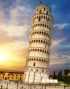 the leaning tower of pisa in italy at sunset