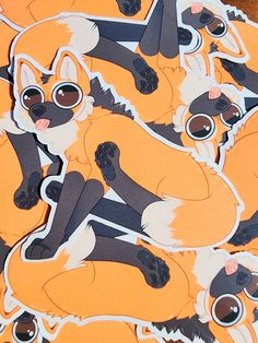 an orange and black sticker with some cute animals on it's back side