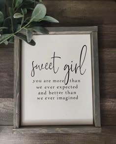 a framed sign that says sweet girl you are more than we ever expected and better than we ever imagine