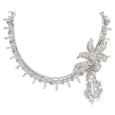 Important exquisite grand diamond floral necklace platinum, high jewelry circa 1950's. 354 total diamonds, approximately 60 carats total. 146 round diamonds approximately F/G color and SI clarity. 169 baguette diamonds F/G color and VS clarity. 39 marquise diamonds approximately FG color SI clarity. Accommodated with an up-to-date appraisal by a GIA G.G. once purchased, upon request. Please contact us with any questions. Item Number N3711 Antique Diamond Necklace, Modern Diamond Jewelry, Drop Necklaces, Diamond Drop Necklace, Pearl Drop Necklace, Diamond Tennis Necklace, Pearl And Diamond Necklace, Bridal Diamond Jewellery, Heart Necklace Diamond