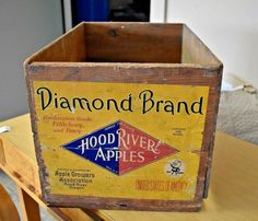 a wooden box sitting on top of a table