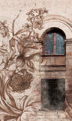 an old building with flowers painted on the side and a window in the middle that is open