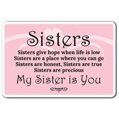 a pink card with the words sisters on it