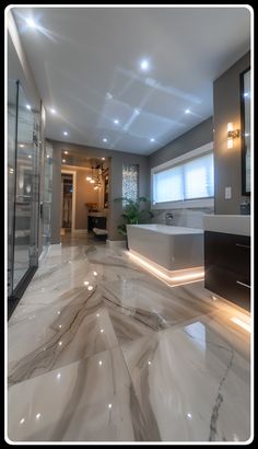 a large bathroom with marble floors and walls