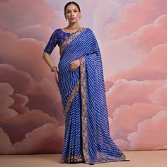 Blue colored saree is made from georgette fabric which is highlighted with beautiful printed work as shown. Comes along with unstitched mono silk blouse piece which you can customise as per your design/style. Occasion - You can wear this saree for party, functions and fashionista. Note:- the actual product may differ slightly in color and design from the one illustrated in the images when compared with computer or mobile screen. Measurements: Saree : Georgette : 5.5 Mtrs Blouse : Georgette : 0.8 Blue Georgette Pre-draped Saree With Pallu, Festive Blue Georgette Pre-draped Saree, Royal Blue Semi-stitched Saree, Embroidered Blue Pre-draped Saree For Diwali, Blue Embroidered Georgette Blouse Piece, Bollywood Style Semi-stitched Royal Blue Saree, Traditional Blue Georgette Pre-draped Saree, Blue Anarkali Style Pre-draped Georgette Saree, Blue Semi-stitched Saree For Festive Occasions