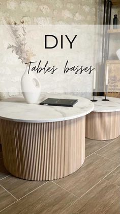 a round table with two vases on it and the words diy tables bases