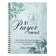 a spiral notebook with the words, my prayer journal