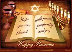 an open book with candles on it and the words happy passover written in hebrew