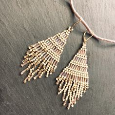 The total length is 3.5". Gold Beaded Tassel  Earrings Color = Matte Gold Material = Brass Size = 13mm x 28mm Earring hook - Base meterial : Brass Size : 20.5 mm  Treatment : Luster  Gold  plated High quality plated. Anti tarnish. hypoallergenic. All items come wrapped individually in a ribboned gift box. Statement Earrings Gold, Sparkle Party, Beaded Fringe Earrings, Custom Initial Necklace, Gold Fringe, Beaded Tassel Earrings, Handmade Jewelry Necklace, Beaded Earrings Patterns, Gold Statement Earrings