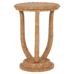 a wooden table with a round top and two curved legs, made out of woven wicker