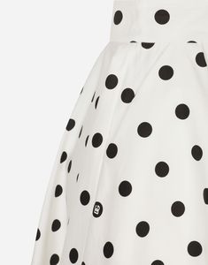 Stretch cotton drill calf-length circle skirt with polka-dot print: Black and white High-waisted Unlined Rear zipper and hook-and-eye fastening The piece measures 65 cm from the waist down on a size IT 40 The model is 175 cm tall and wears a size IT 40 Made in Italy The difference in the print placement that you may find on this product is a feature of Dolce & Gabbana’s “Handmade” pieces. A detail that makes every garment or accessory unique and exclusive. Wide Leg Jeans Cropped, Races Outfit, Straight Leg Jeans Men, Calf Length Skirts, Latest Skirts, Print Black And White, Fur Coats Women, Floor Length Skirt, Polka Dot Skirt