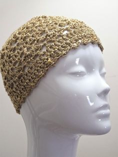 Inspired by the boho chic and glam, Abba-esque styles of the 1970's, this crochet gold skull cap with sequins will put you in the party mood. If you're planning a night out with the girls or heading out to a concert or festival, this hat adds a fun finishing touch to your outfit. It is hand crafted with an Ecotec recycled cotton-blend yarn made from new, pre-consumer cotton textile scraps that would otherwise be discarded in landfills. This gold skull cap is finished with a matching glitter thre Textile Scraps, Glitter Skull, Gold Glitter Party, Hat Fits, Sequin Party, Gold Skull, Glitter Party, Boho Glam, Hair Brained