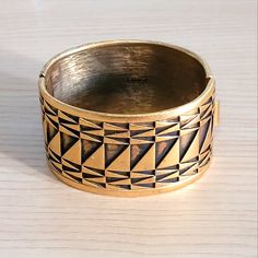 This Is A Dramatic, Striking Hinged Cuff Bracelet By Monet Circa 70s-80s, In Excellent Condition With Very Light Wear For Age. It Offers An Exotic Egyptian Look, With Geometric Design In A Two-Toned Pattern. Ideal For Wrist Size 7 (Could Fit Up/Down 1 Size) Fastens With Tongue Closure Signed By Monet Inside The Band And Has A Pleasing Solid Feel. Luxury Vintage Brass Cuff Bracelet, Vintage Multi-stone Bangle Bracelet, Vintage Gold-tone Metal Bracelet, Monet Jewelry Vintage, Luxury Gold-tone Brass Bracelet, Monet Jewelry, Vintage Monet, Womens Jewelry Bracelets, Geometric Design