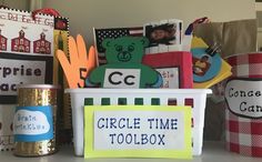 there is a basket with some pictures on it and a sign that says circle time toolbox