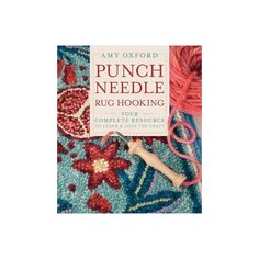 the book punch needle rug hooking is laying on top of some yarn and knitting needles