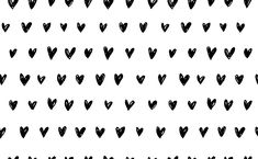 black hearts drawn on white paper