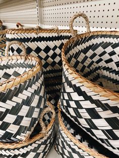 several woven baskets are stacked on top of each other