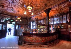 an ornately decorated bar with lots of lights