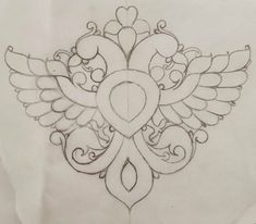 a drawing of an ornate design with hearts and wings on it's back side