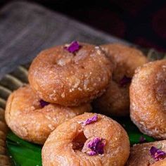 a bunch of doughnuts that are on a plate