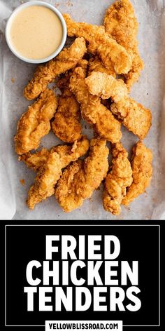 fried chicken tenders with dipping sauce on top and the words, fried chicken tenders