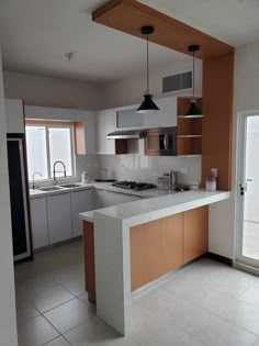 the kitchen is clean and ready for us to use in its new owner's home