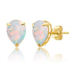 PRICES MAY VARY. SOLID 14K GOLD - All parts of these earrings are crafted in your choice of white or yellow gold and stamped with “14k”. 14k gold will not oxidize or discolor. Wear these earrings every day, everywhere! DETAILS - Premium quality created opal gemstones that measure 8x6 millimeters securely hand-set with sturdy prongs. Because of the natural characteristics of gemstones, shades may vary. ENDURING QUALITY & STYLE - Classic, timeless, and versatile gemstone earrings that you can wear Gemstone Stud Earrings, Gemstone Studs, Birthstone Earring, Opal Earrings, October Birth Stone, Opal Gemstone, Pear Shaped, Gemstone Earrings, Jewelry Earrings Studs