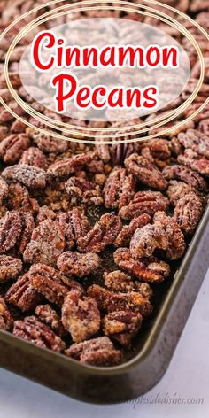 a pan filled with cinnamon pecans sitting on top of a table