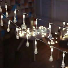 some lights that are hanging from a string