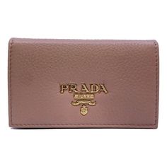 This womens Prada card case wallet features beautiful neutral grained leather that makes it the perfect accessory for anybody. The Prada Paris logo featured on the front is eye-catching. Its large interior and two slip pockets mean organizing is a breeze. You'll never want to leave home without this sophisticated wallet. Includes authenticity cards and Prada box. Size: one size.  Color: Beige.  Gender: female.  Age Group: adult. Leather Card Holder Wallet, Leather Credit Card Holder, Paris Logo, White Shoulder Bag, Card Case Wallet, Leather Card Case, Card Holder Wallet, Small Wallet, Credit Card Holder