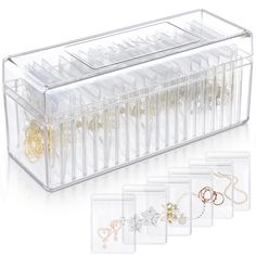 a clear jewelry box filled with lots of different types of necklaces