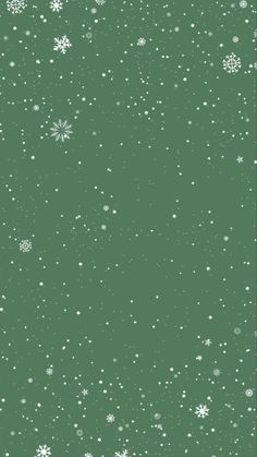 a green background with white snowflakes and stars