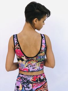 These comfortable and cute cropped bralets can be worn with the matching sports bra for added support. Paired with one of the many matching shorts, this top can be worn in the studio, as a bathing suit or out on the street. double sided with 2 different yet complimenting prints, made from recycled water bottles and spandex UV protection Pink Cropped Sports Bra For Workout, Pink Cropped Gym Crop Top, Summer Streetwear Sports Bra, Sporty Moisture-wicking Crop Top For Summer, Summer Sportswear Crop Top With Moisture-wicking, Sportswear Moisture-wicking Crop Top For Summer, Moisture-wicking Sportswear Crop Top For Summer, Pink Seamless Sports Swimwear, Multicolor Sports Bra For Summer Workouts