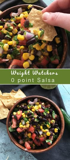 a bowl filled with black beans, corn and tortilla chips next to a hand holding a tortilla chip