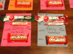 candy bar wrappers are laid out on top of each other with writing on them