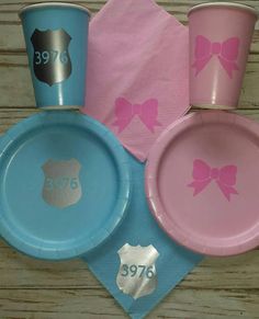 pink and blue paper plates with bows on them