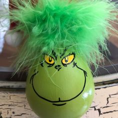 an egg with a green hair on it