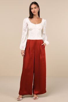 The Lulus Stunning Chicness Rust Red Satin High-Rise Wide-Leg Pants will easily elevate any of your favorite fall 'fits! Sleek woven satin shapes these must-have pants that feature a high, banded waist (with elastic at the back for fit) and trendy, wide pant legs with pleated details, side seam pockets, and full-length hems. Hidden side zipper/clasp. Add a sweater and some boots and you'll instantly have a perfect ensemble! Fit: This garment fits true to size. Length: Floor length. Size medium I 1940s Womens Pants, 40s Inspired Outfits, Pants Outfits For Women, Colored Pants Outfits, Pant Outfits For Women, Satin Pant, Orange Pants, Color Pants, Satin Pants