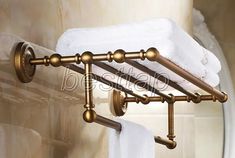 a towel rack that is attached to the wall