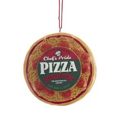 a pizza shaped ornament hanging from a string