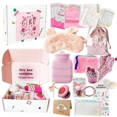 a box filled with lots of pink items and accessories next to a stuffed animal toy