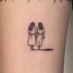 two people standing next to each other on the arm