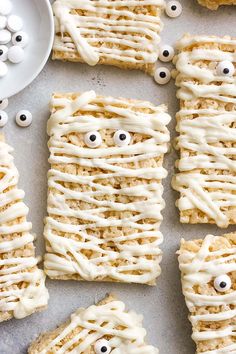 halloween rice krispy treats with eyes and googly eyes on them, ready to be eaten