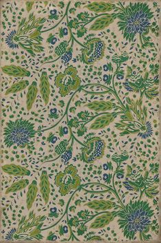 a green and yellow floral design on a beige background with blue, white, and green flowers