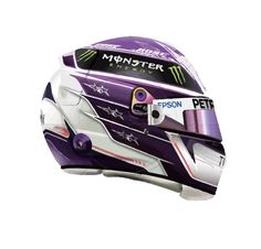 a helmet with the words monster painted on it's side and purple stripes, in front of a white background